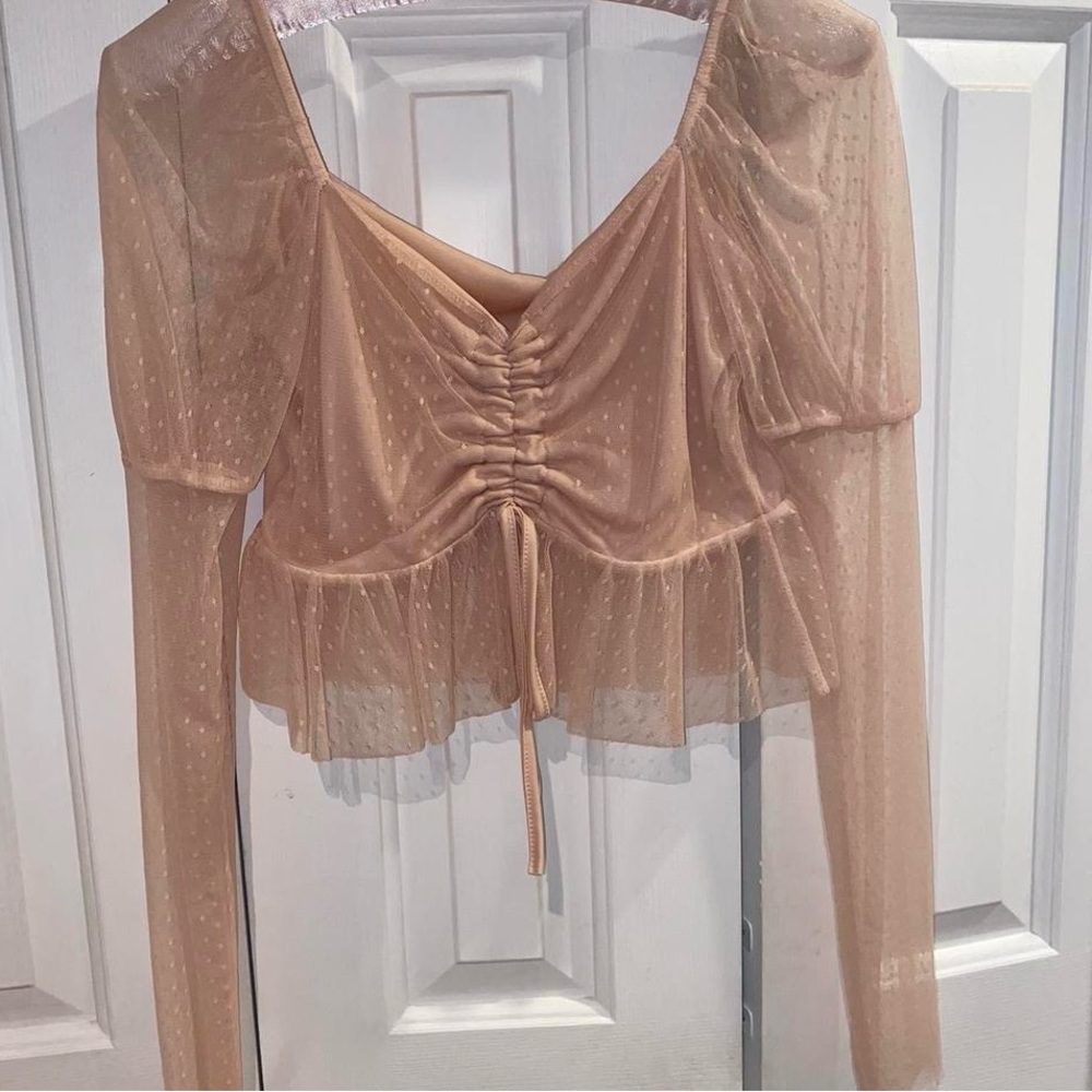 New , tag has been removed. Worn once . Size small/ M. Sheer mesh long sleeve